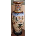 A very large Oriental pottery vase on wooden stand,