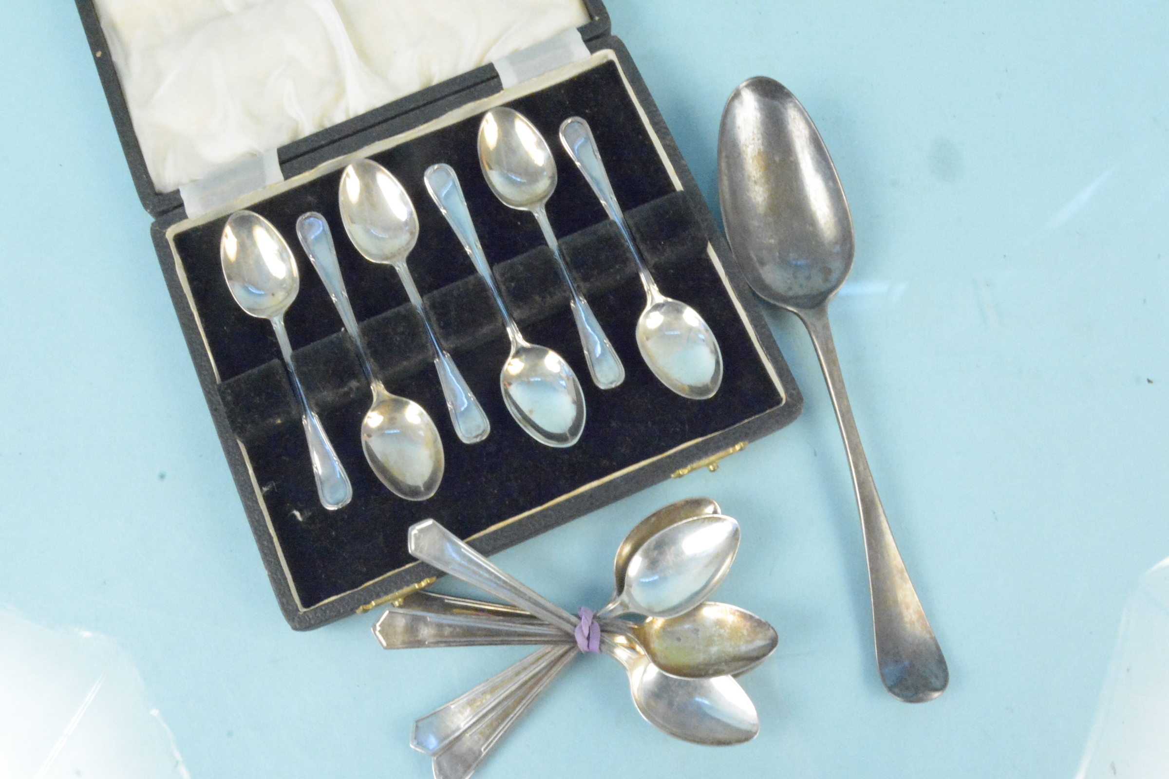 A cased set of six silver teaspoons,