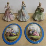 A pair of vintage Dresdon style hand painted plaques plus three ceramic figurines