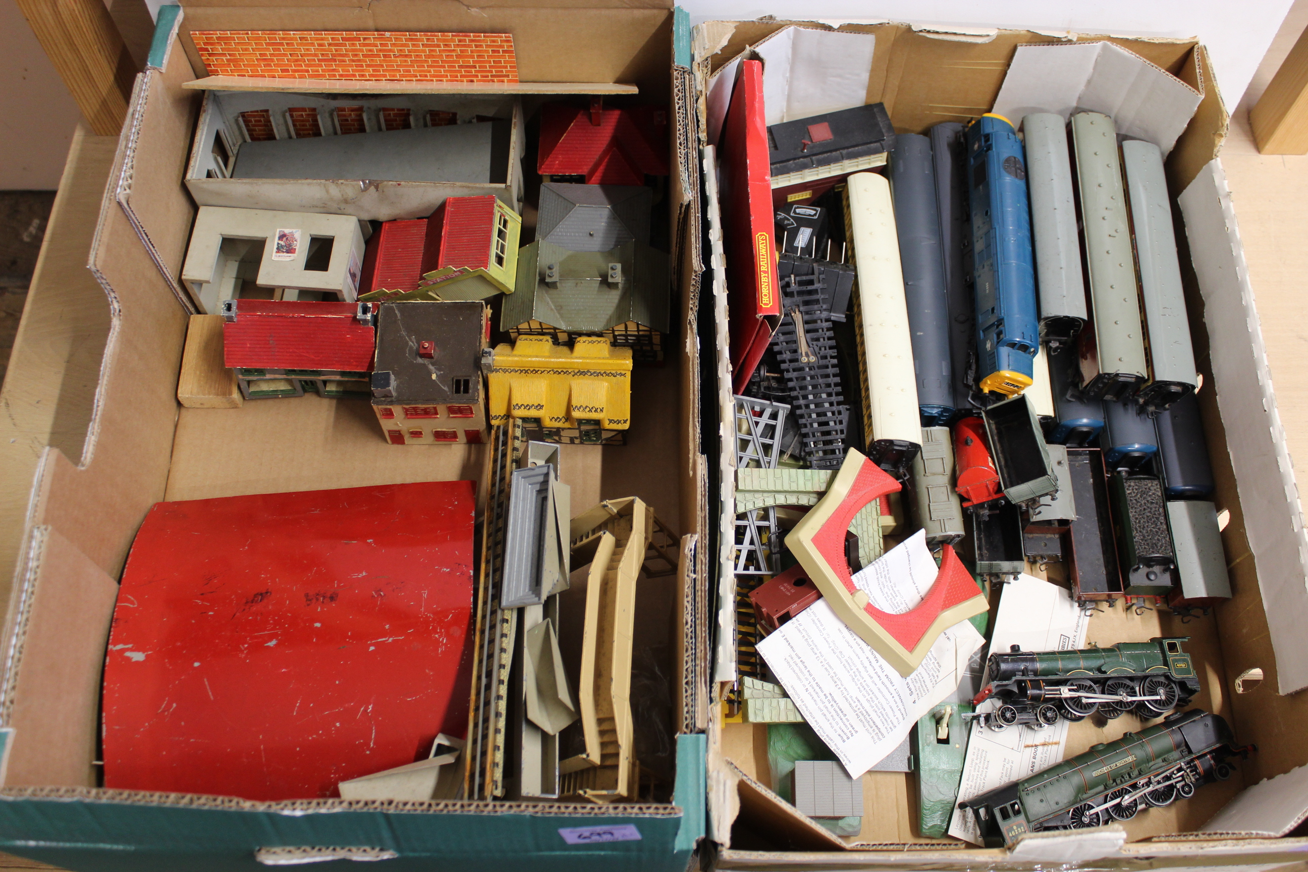 Two boxes of mixed vintage Hornby train sets and accessories including two engines,