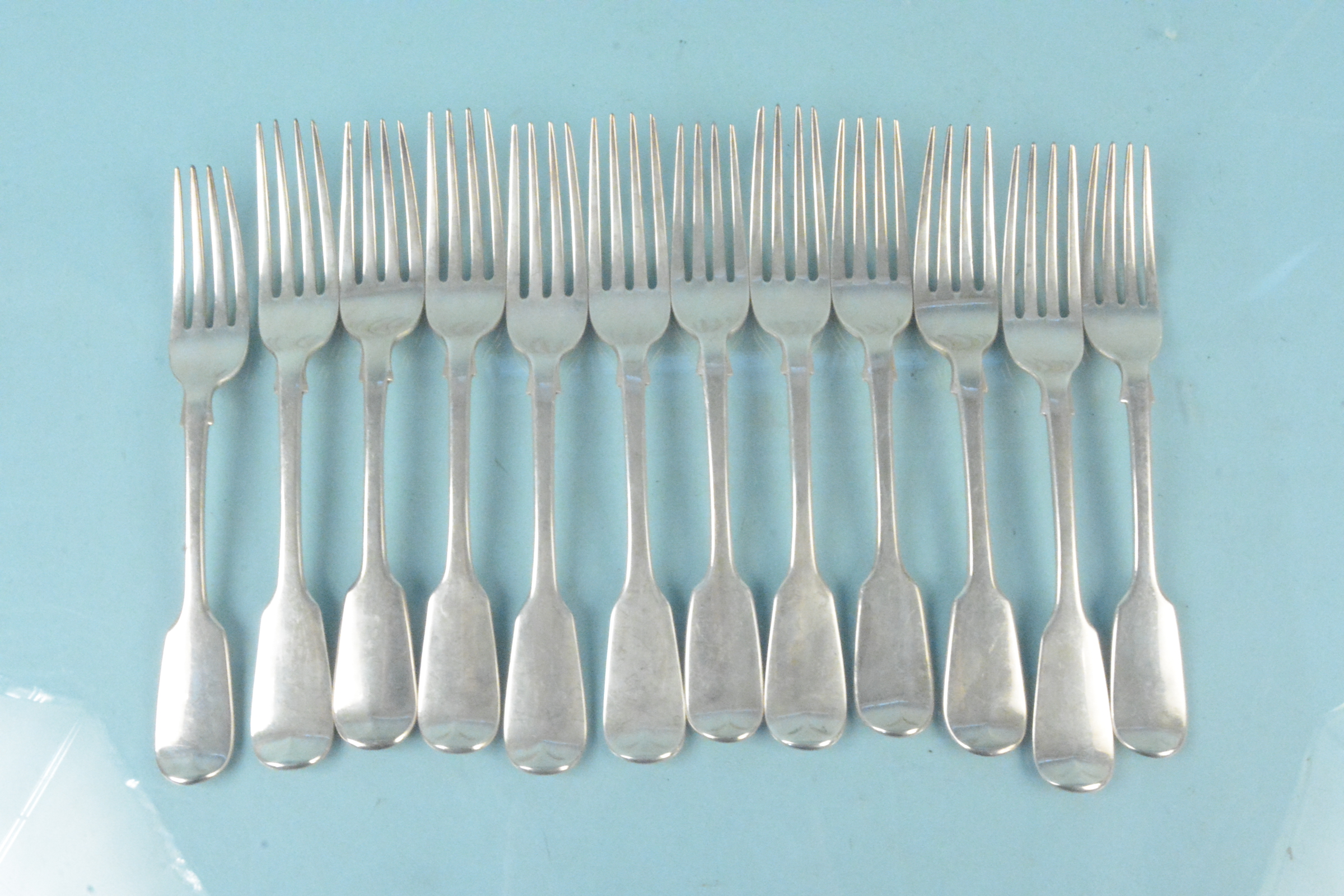 A quantity of Victorian silver forks of various ages and makers,