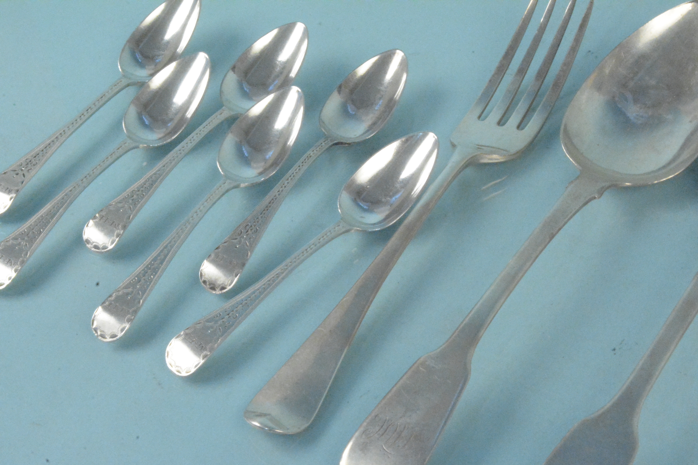 A collection of Georgian silver cutlery to include a set of six teaspoons, - Image 2 of 3