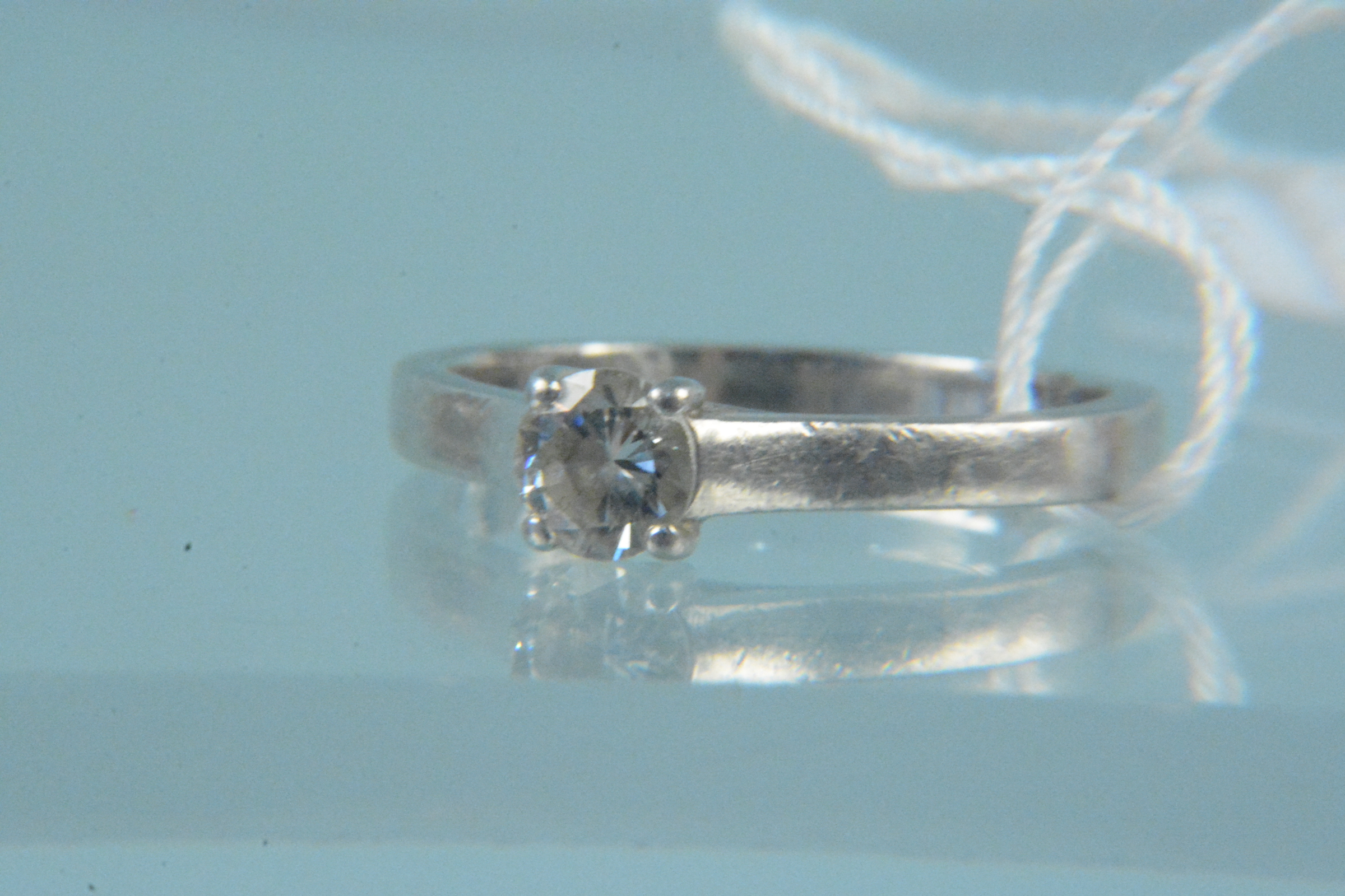 A platinum diamond solitaire ring, size K, weight approx 3.