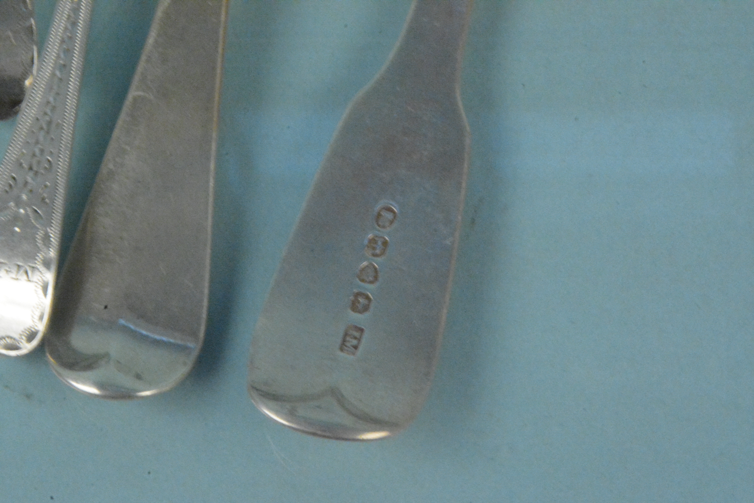 A collection of Georgian silver cutlery to include a set of six teaspoons, - Image 3 of 3