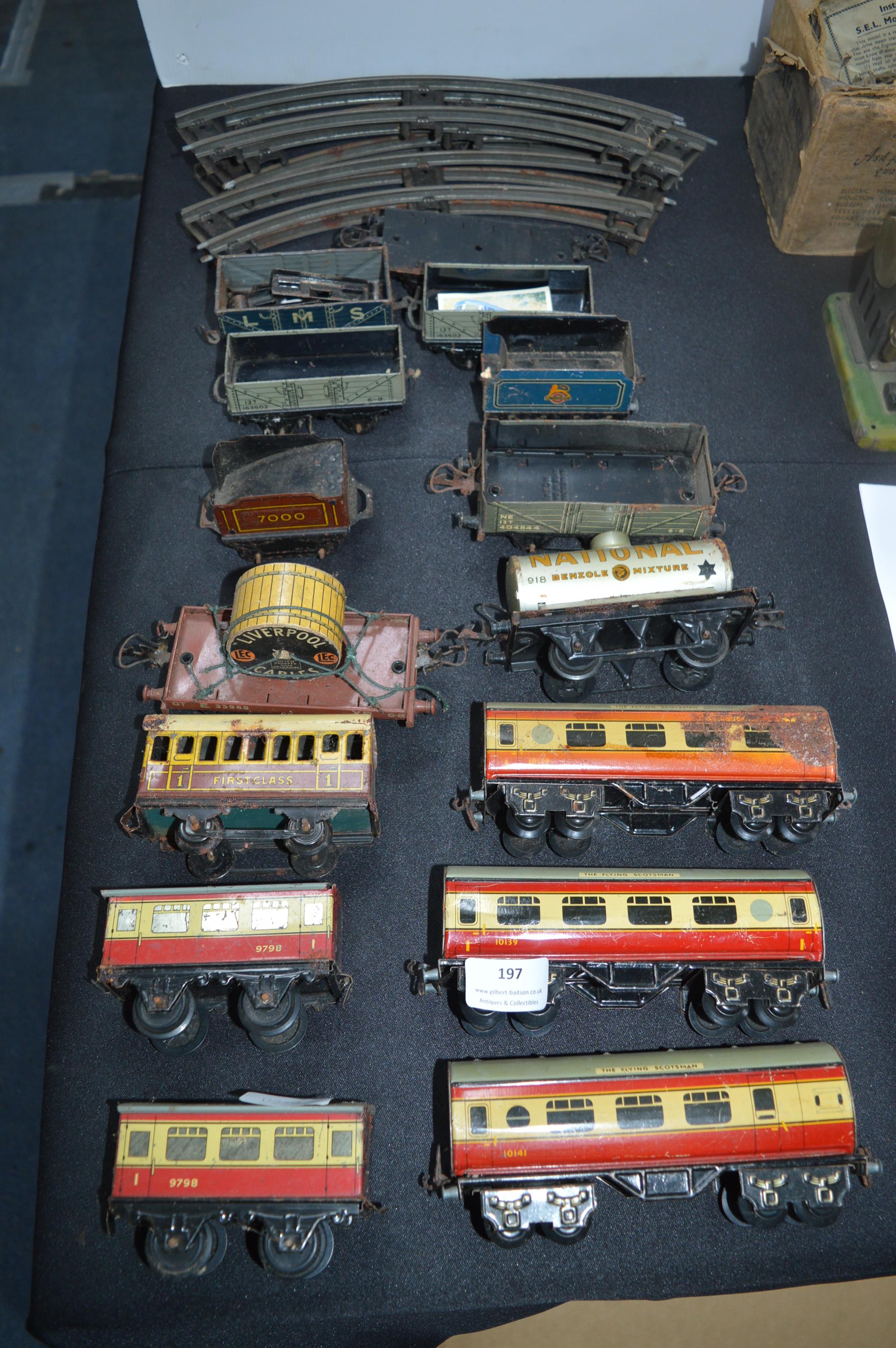 O Gauge Part Train Set Including Flying Scotsman Coaches, Goods Vehicles, and Track