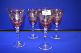Four Cranberry Glass Etched Wine Glasses