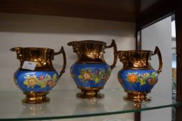 Set of Three Victorian Copper Lustre Jugs with Blue & Floral Design