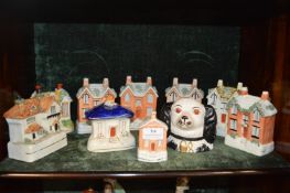 Ten Victorian Staffordshire Flatback Money Boxes, Cottages, and a Spaniel