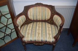 Ornate Carved Oak Chair with Floral Upholstery