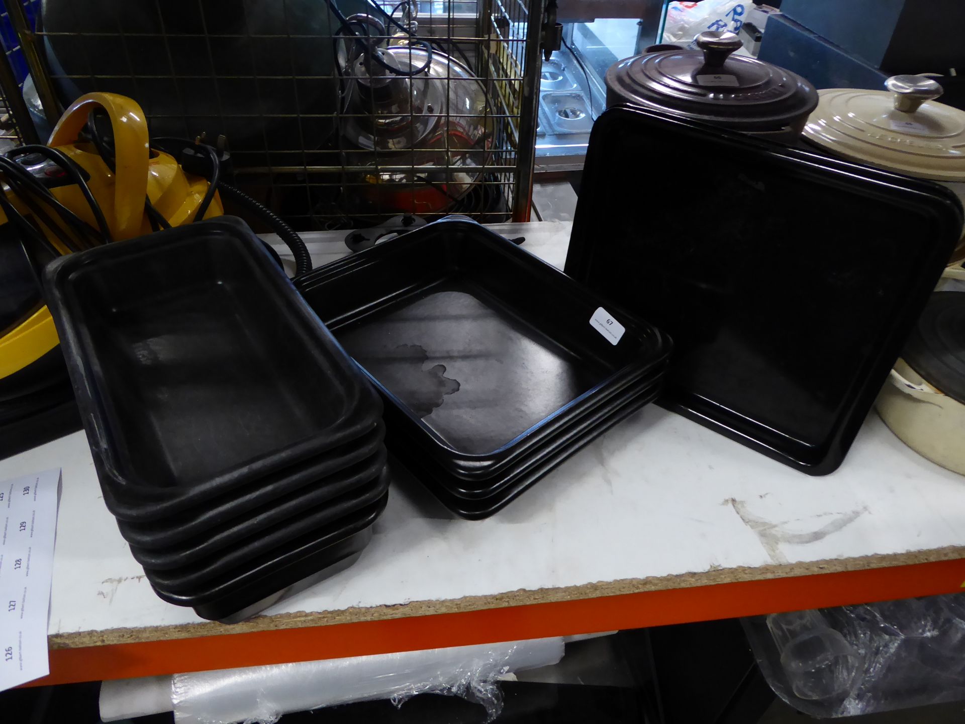 * 8 x gastro sized stoneware dishes and 3 x heavy metal baking trays