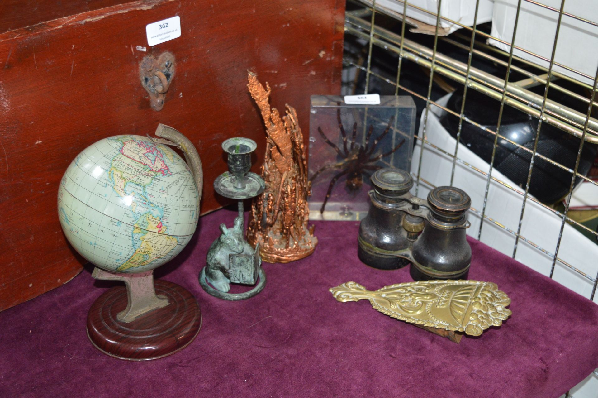 Small Globe, Binoculars, Candlestick and a Spider