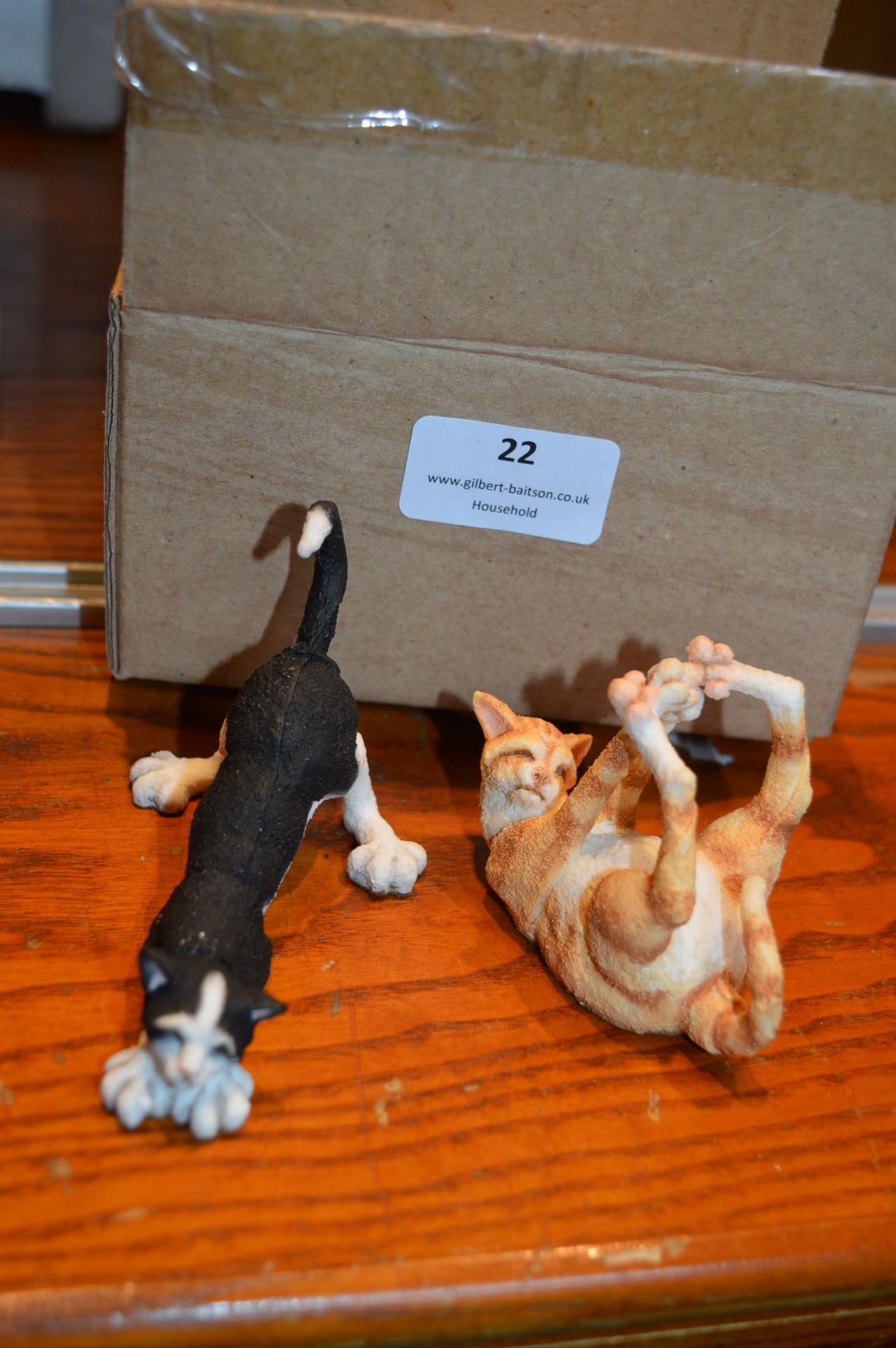 Two Cat Figures