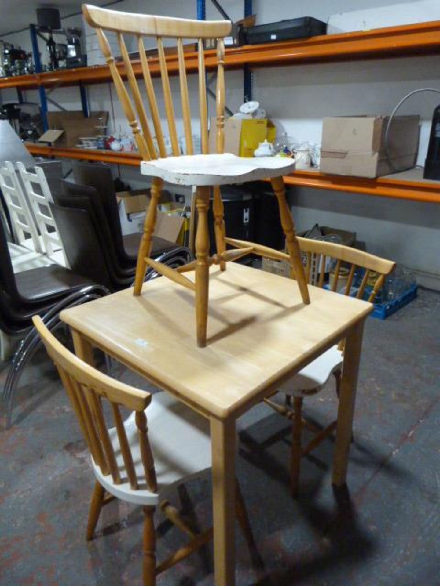 Small Wooden Table with Three Chairs