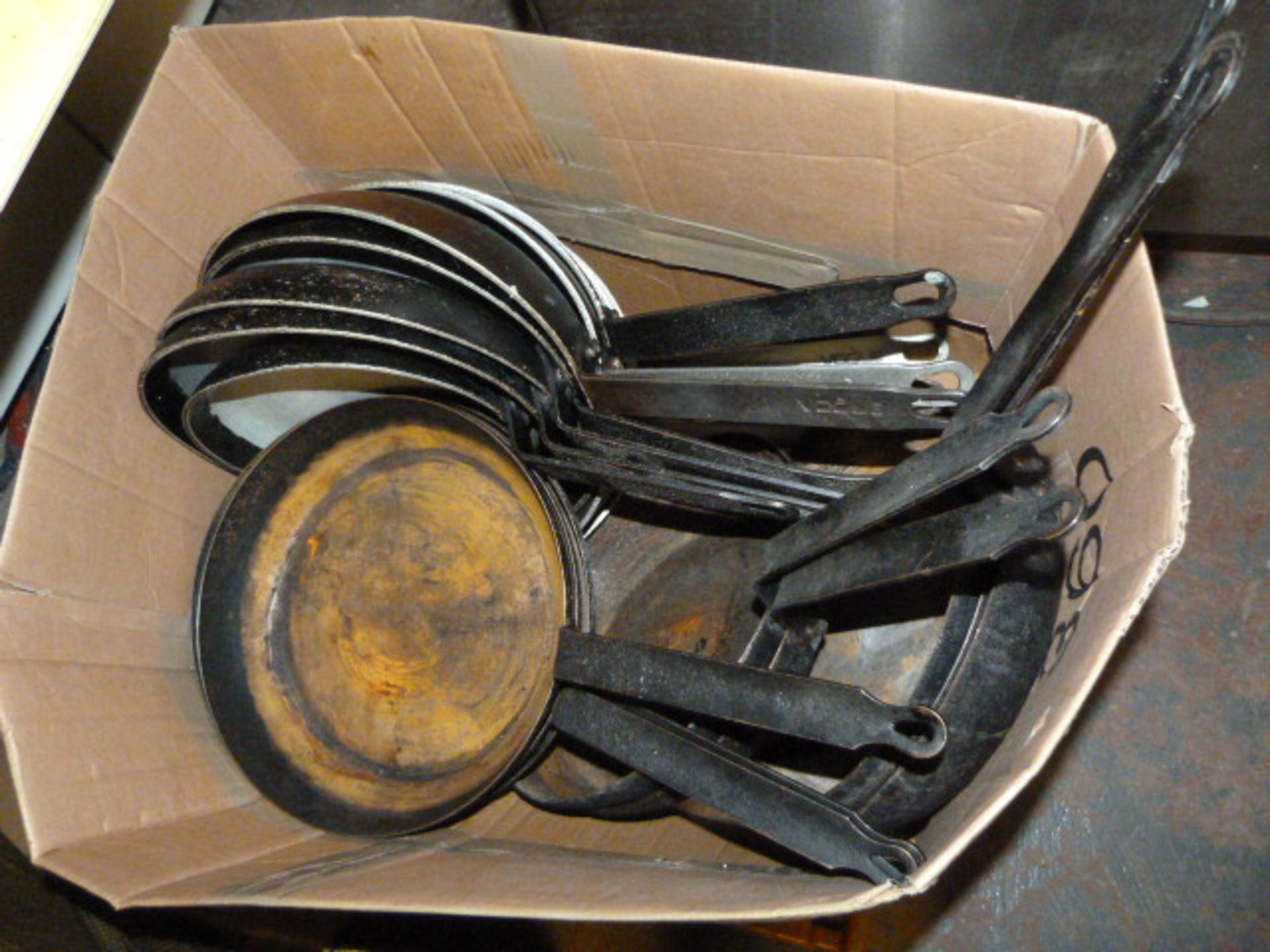 *Box of Frying Pans