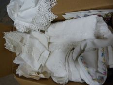 Box of Tablecloths Including Lace, Linen, and Embr