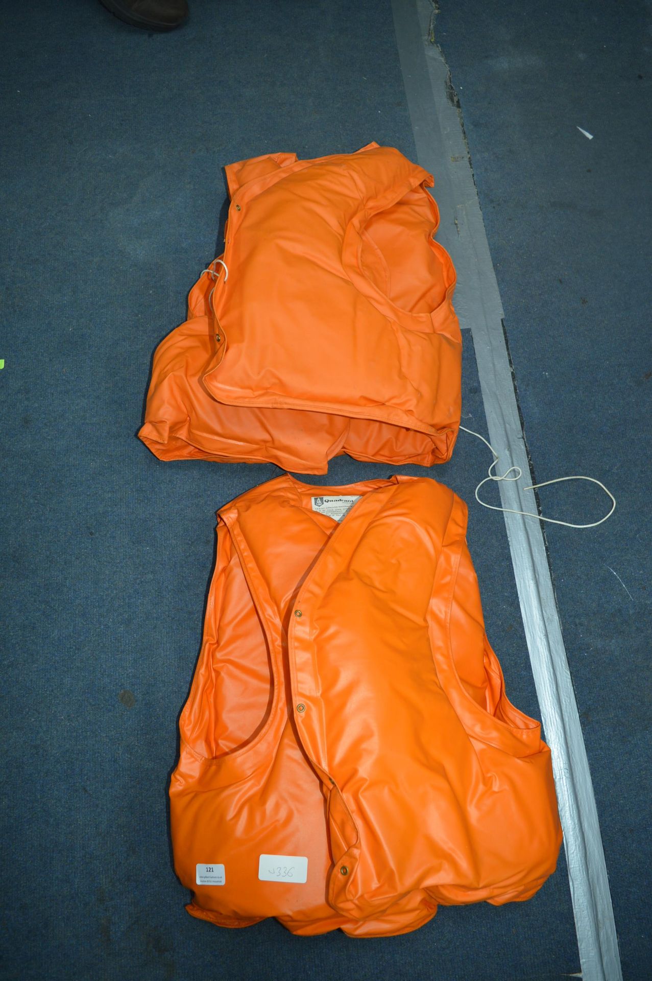 Two Orange Life Jackets