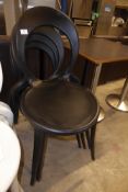 * 4 x modern stacking chairs by italian designer - black plastic