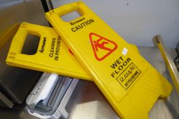 * 2 caution floor signs