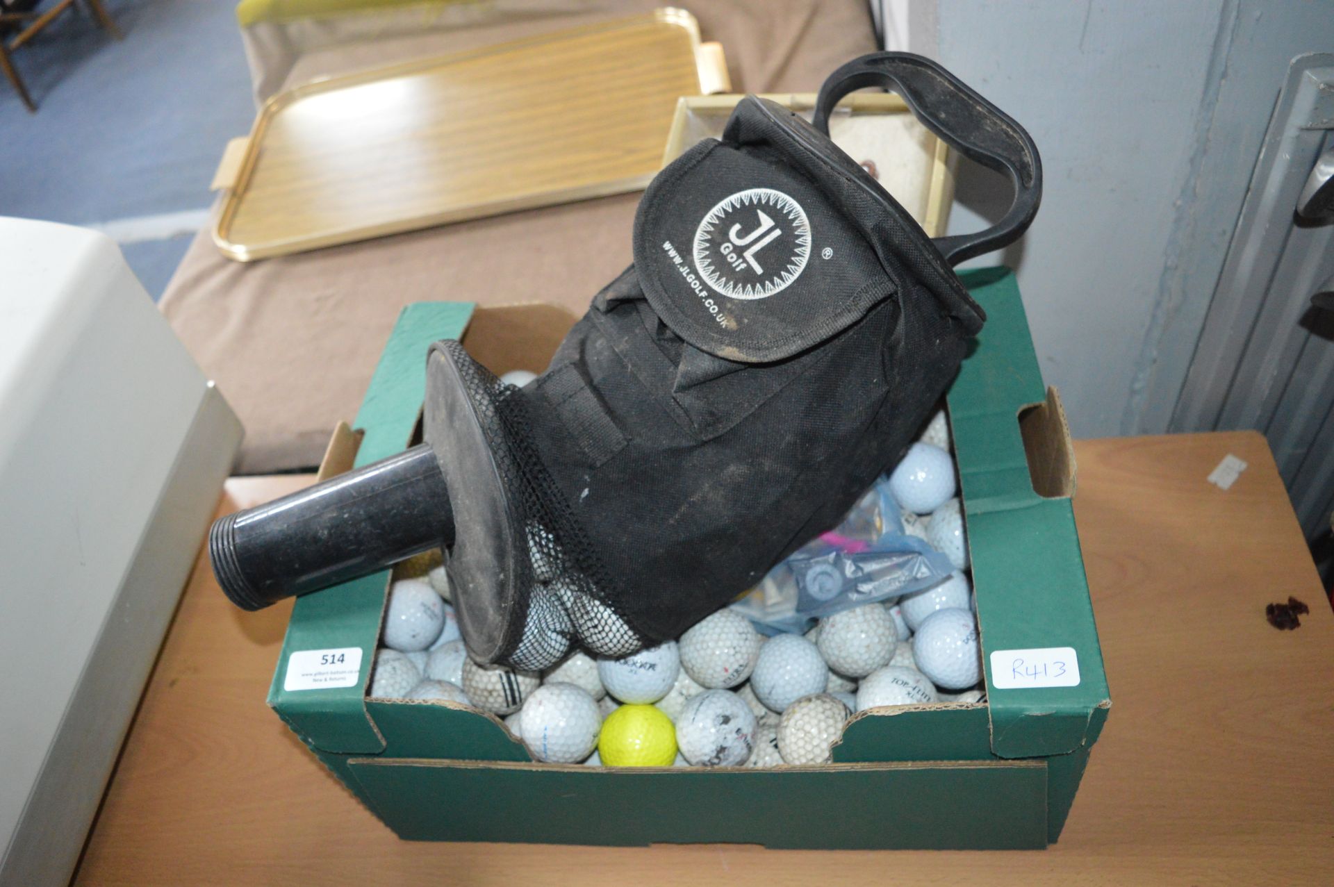 Box of Golf Balls and a GL Golf Ball Carrier