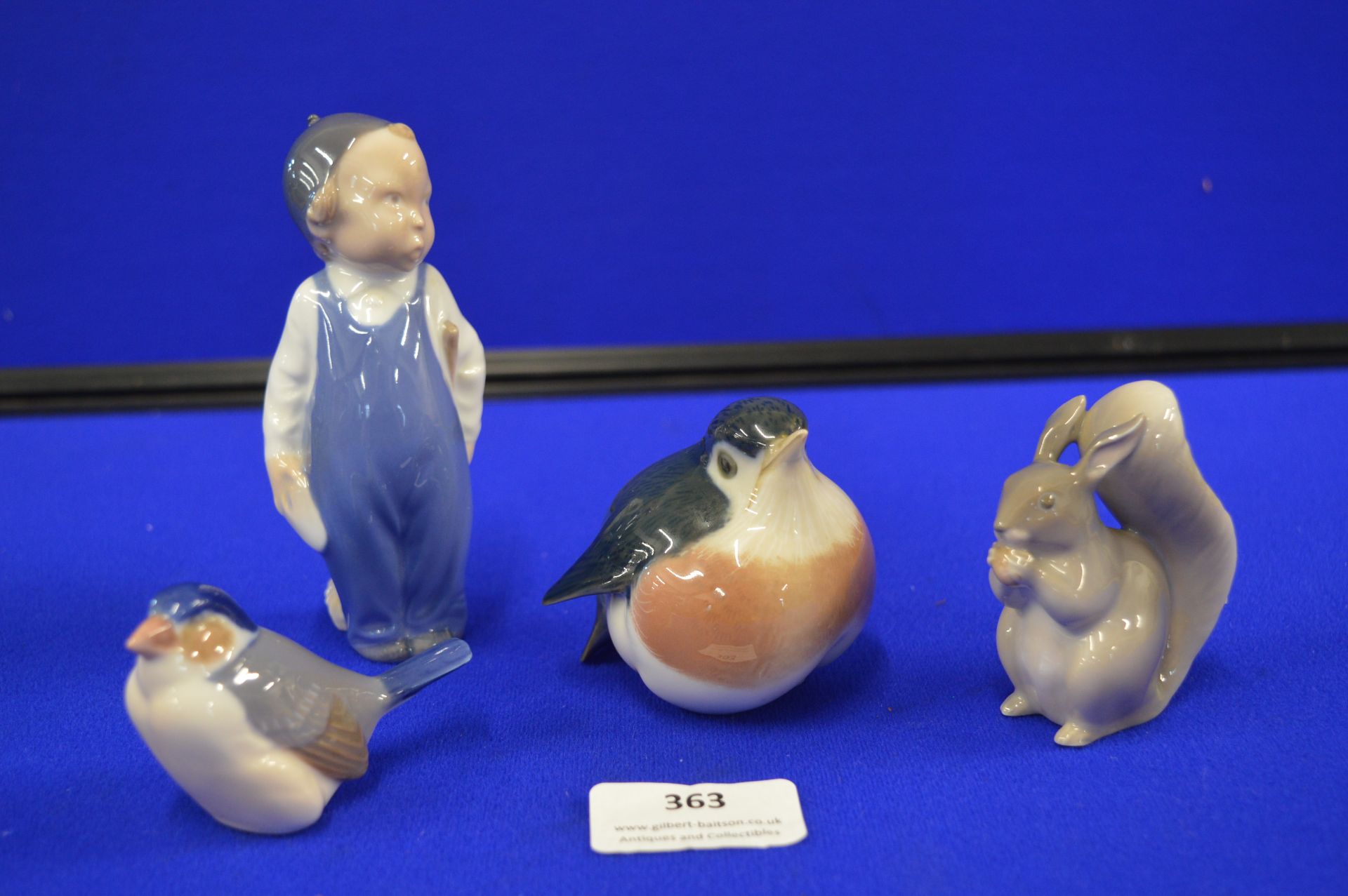 Four Royal Copenhagen Denmark Figures; Birds, Squirrel and a Boy