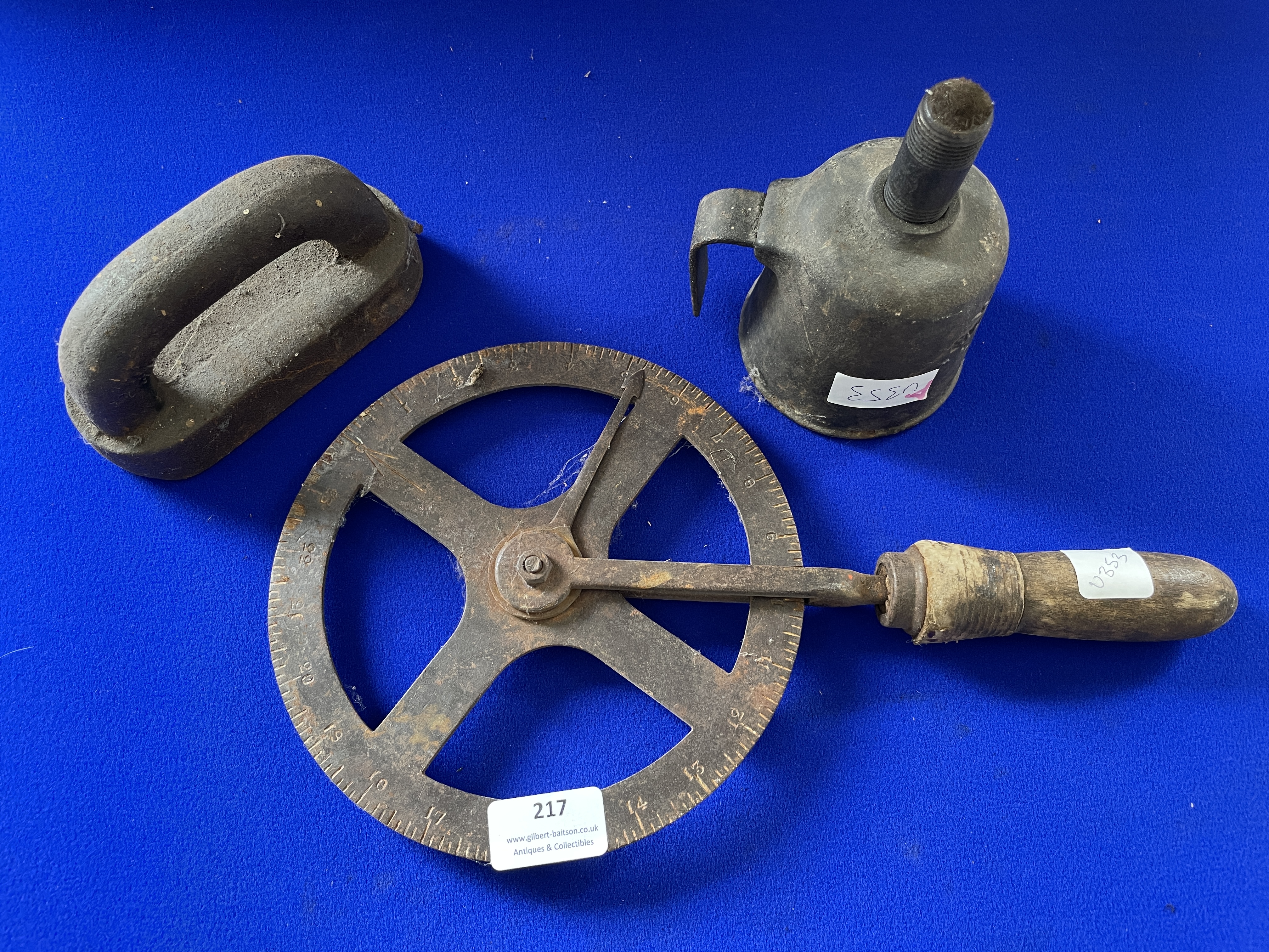 Vintage Measuring Wheel, Engineers Lamp, and an Iron