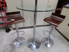 * Two Adjustable Bar Stools and Glass Topped Table