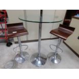 * Two Adjustable Bar Stools and Glass Topped Table