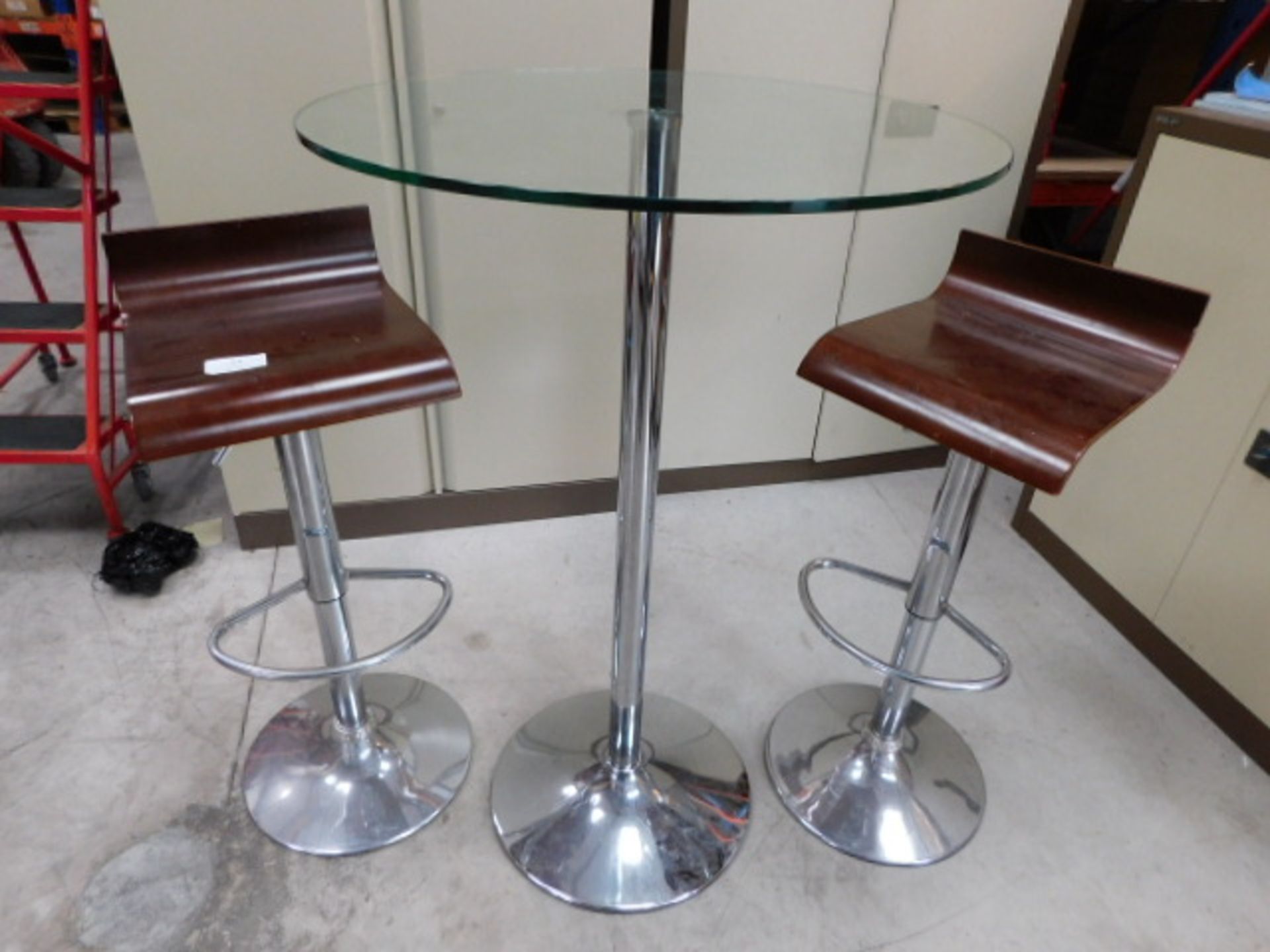 * Two Adjustable Bar Stools and Glass Topped Table