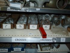 *Shelf of Various Pipe Fittings, T-Sections, etc.