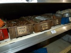 *Shelf of Various Pipe Cap Ends and Threaded Bars