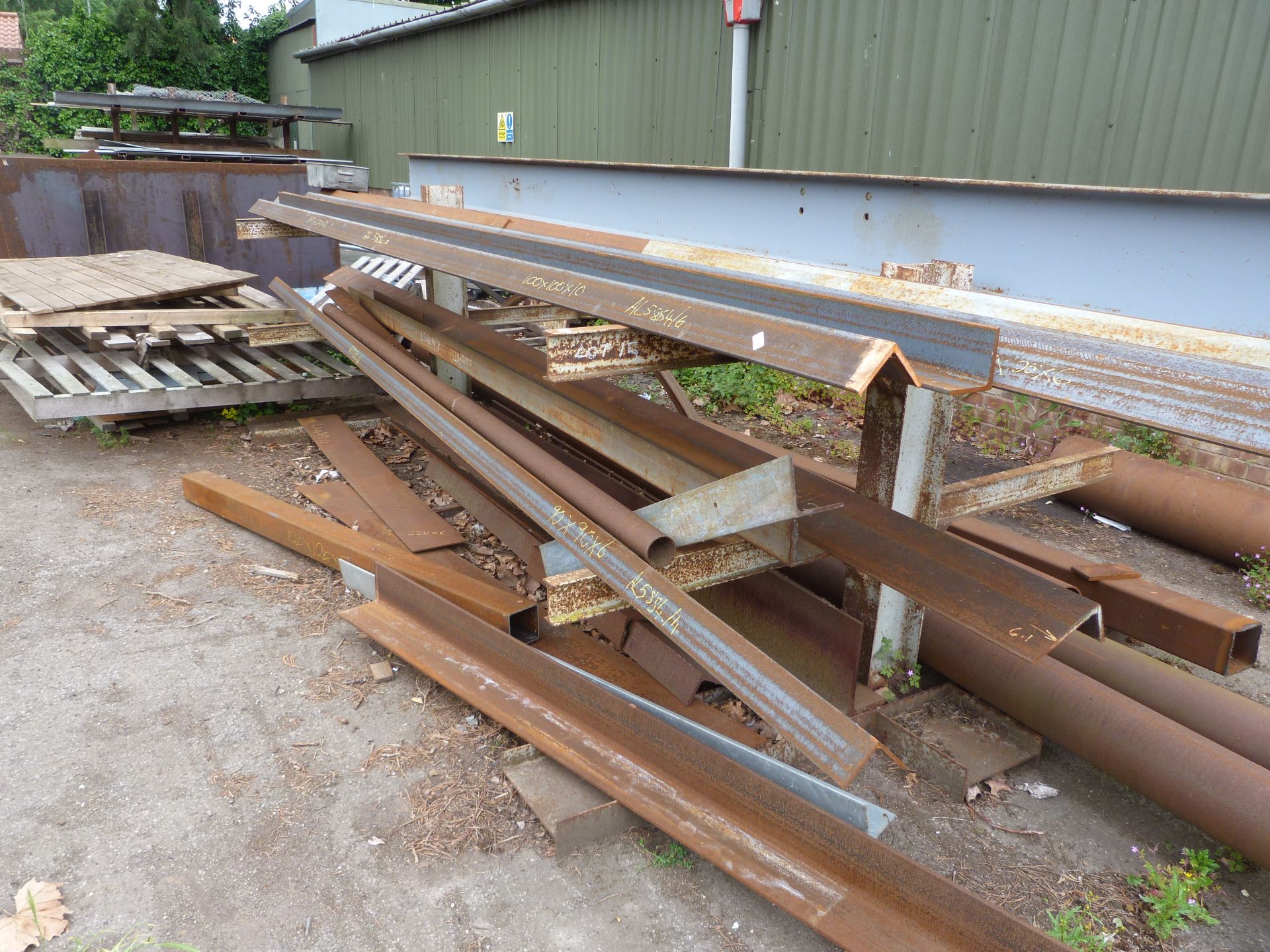 *Contents of Steel Racks (lot 15) to Include Various Lengths of Steel Angle, Flat Bar, and Beam
