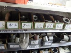 *Shelf of Various Fittings, Threaded Pipe Reducers, etc.