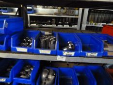 *Shelf of Various Stainless Steel Threaded Pipe Fittings