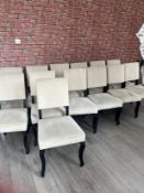 *Thirteen Cream Upholstered Dining Chairs on Dark