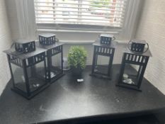 *Four Candle Holders and a Decorative Box Plant