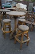 Rustic Wooden Cartwheel Table with Three Barstools