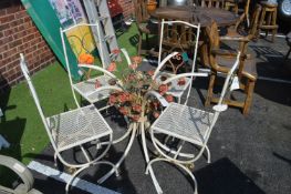 Four Garden Chairs and Metal Floral Table Support