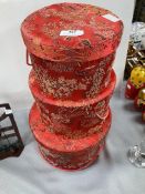 Three Fabric Covered Storage Boxes