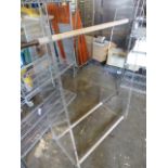 * clothes rail with perspex ends
