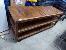 * low level wooden table/display shelf on castors - rustic/industrial. 1380w x 500d x 600h