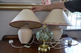 Two Cream Pottery Table Lamps and a Glass Lamp