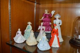 Eight Figurines by Coalport and Royal Doulton