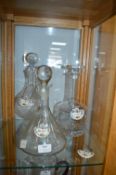 Three Glass Decanters with Spirits Labels