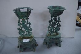 Two Cast Iron Decorative Candlesticks
