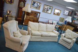 Three Piece Suite in Cream Upholstery
