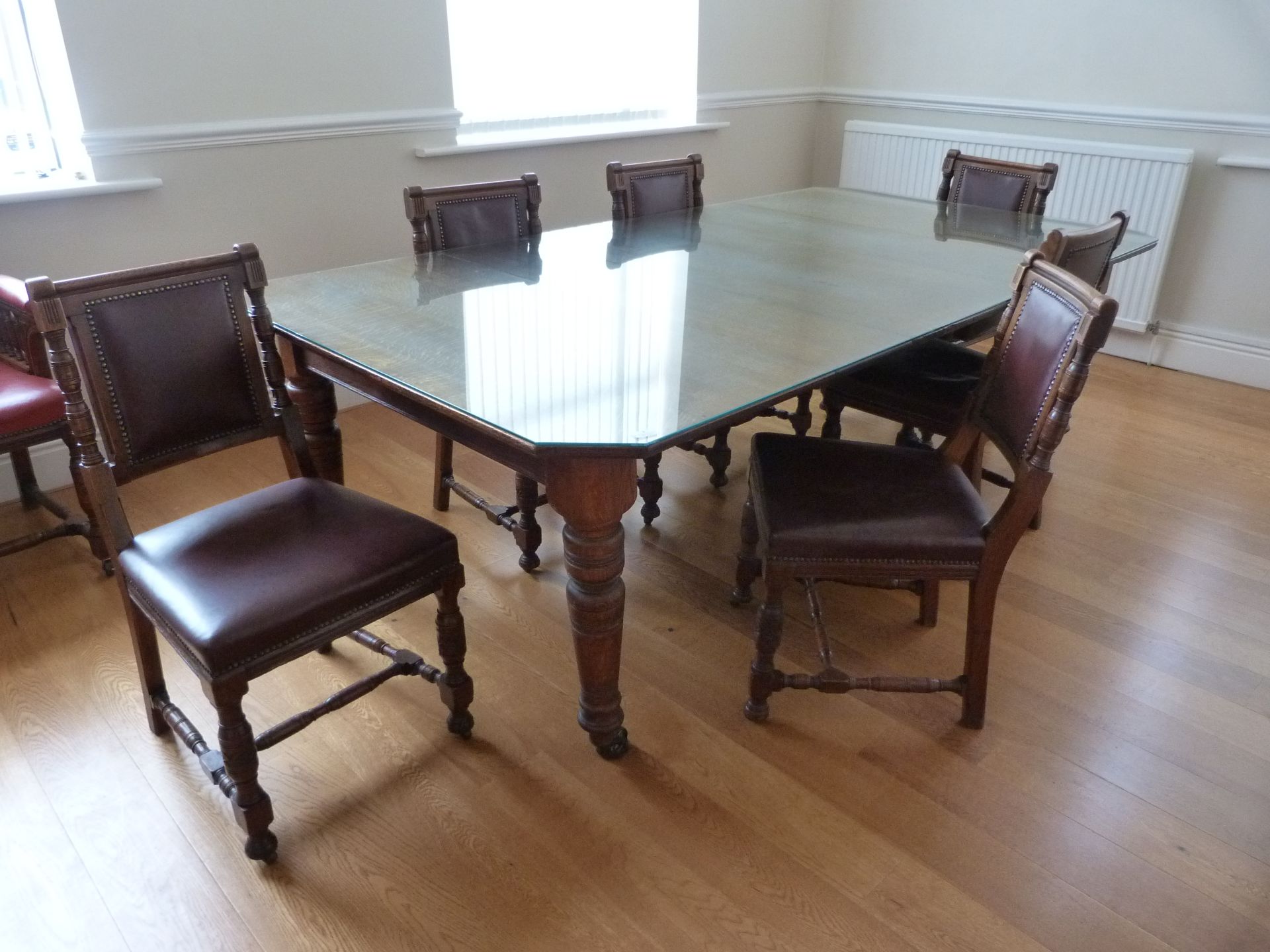 *Edwardian Style Segmented Boardroom Table and Six Chairs with Brown Leather Upholstery