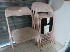 *Six Pink Tubular Framed Folding Chairs with Pink Upholstery
