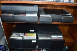 Four Storage Boxes of CDs and Cassette Tapes