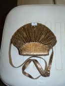 *Gold Handbag in the form of a Shell