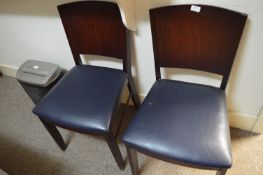 *Two Darkwood and Blue Leather Chairs